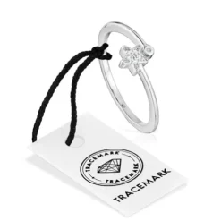 Anillo pequeño estrella de oro blanco con diamantes TOUS Grain