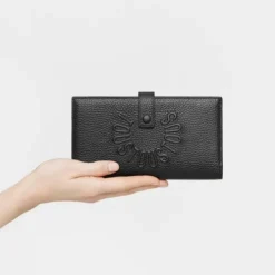 Billetera grande Flap de piel negra TOUS Miranda