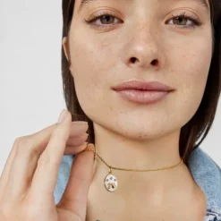 Colgante Acuario con baño de oro 18 kt sobre plata, nácar y topacios TOUS Horoscope