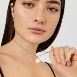 Colgante Cáncer con baño de oro 18 kt sobre plata, nácar y topacios TOUS Horoscope