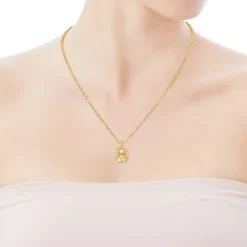 Colgante de oro y perlas Costura