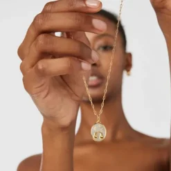 Colgante Libra con baño de oro 18 kt sobre plata, nácar y topacios TOUS Horoscope