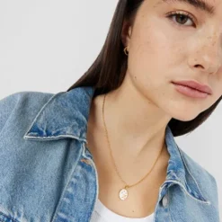 Colgante Sagitario con baño de oro 18 kt sobre plata, nácar y topacios TOUS Horoscope