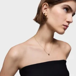 Collar corto motivo oso con baño de oro 18 kt sobre plata y ónix Color Bear