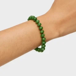 Pulsera con baño de oro 18 kt sobre plata y cuarzita verde Hold Oval