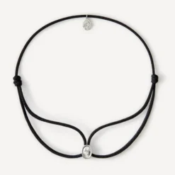 Pulsera de oro blanco con diamante y cordón negro TOUS ATELIER