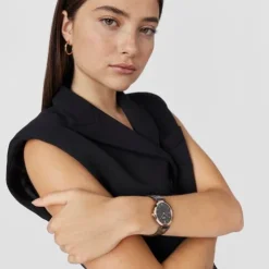 Reloj analógico con brazalete de acero IP gris y acero IPRG rosado S-Band