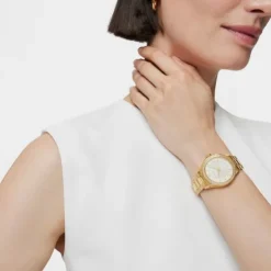 Reloj analógico T-Shine de acero IP dorado con zirconias cúbicas